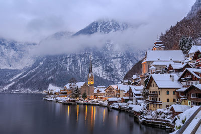 Panoramic view of city against sky during winter