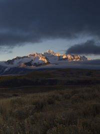 Scenic view of snowcapped mountains against sky