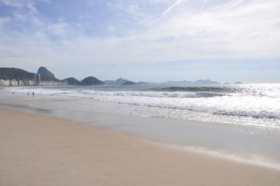 Scenic view of beach against sky