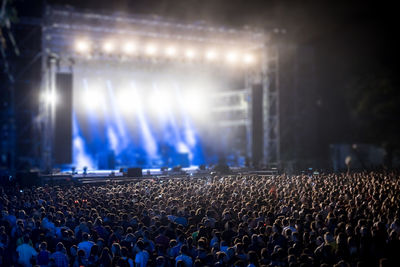 Crowd at music concert at night