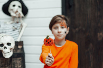 Portrait of boy with toy