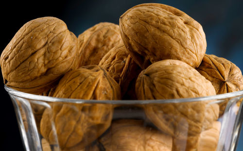 Close-up of food on table against black background