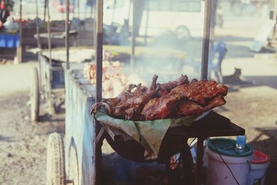 High angle view of meat cooking outdoors