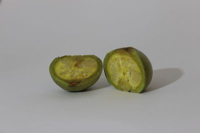 Close-up of apple against white background