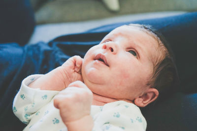 Portrait of cute baby lying down