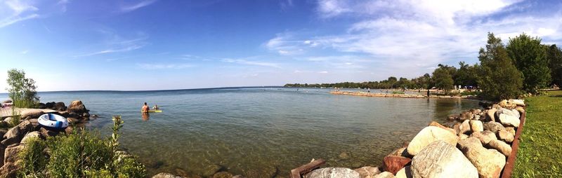 Panoramic view of people on beach