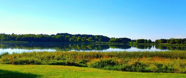 Scenic view of lake against clear sky