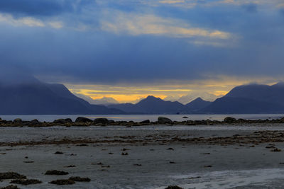 Scenic view of mountains against sky during sunset