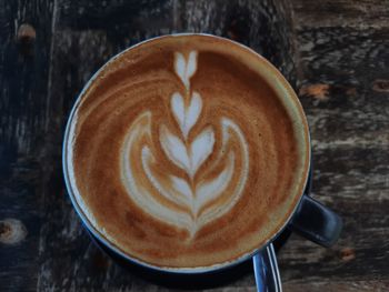 Close-up of cappuccino on table