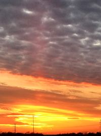 Low angle view of dramatic sky during sunset