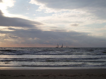 Scenic view of sea against sky at sunset