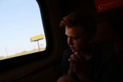 Boy traveling in car