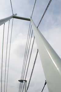 Low angle view of cables against sky