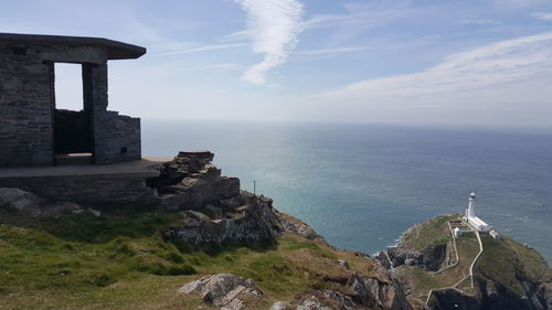 Cropped built structure against calm sea