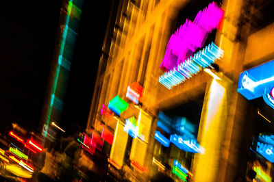 Multi colored illuminated lights in city at night