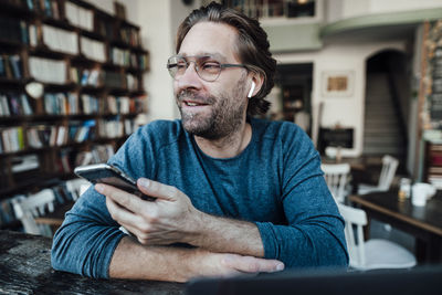Portrait of man using mobile phone