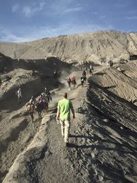 Group of people walking on landscape