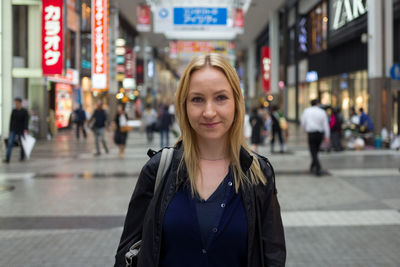 Portrait of woman in city