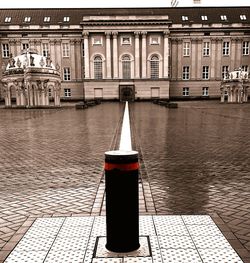 Fountain with buildings in background