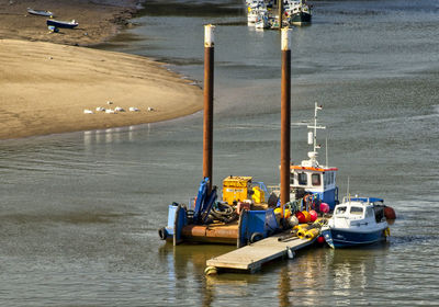 High angle view of boats moored at sea