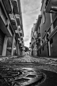 Narrow road along buildings