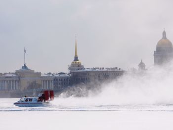 Hovercraft on the river against sky