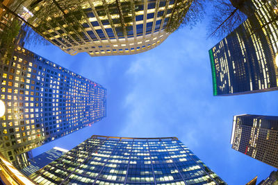 Low angle view of modern buildings against sky