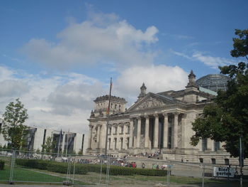 View of historical building against cloudy sky