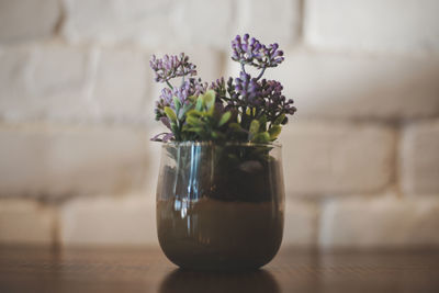 Close-up of glass vase on table