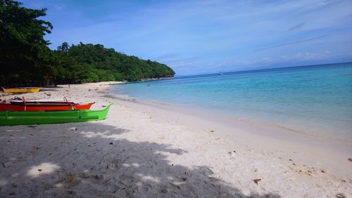 Scenic view of beach against sky