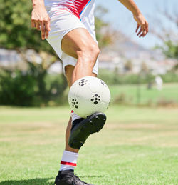 Man playing soccer on field