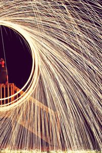 Close-up of wire wool at night