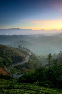 Scenic view of landscape against sky during sunset