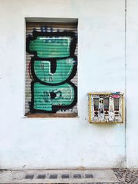 Close-up of clock on wall