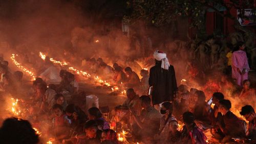 A saint walking along the followers of lokhnath brahmachari ashram