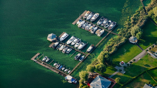 High angle view of buildings by sea