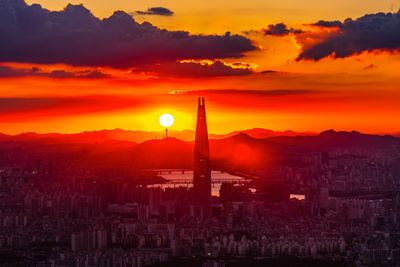 Cityscape against sky during sunset