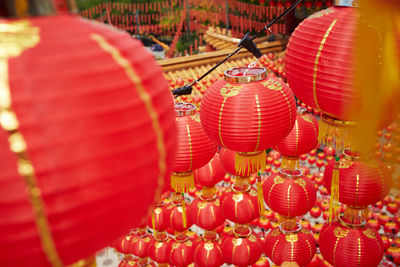 Red chinese lanterns hanging in row