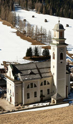 Building against sky during winter