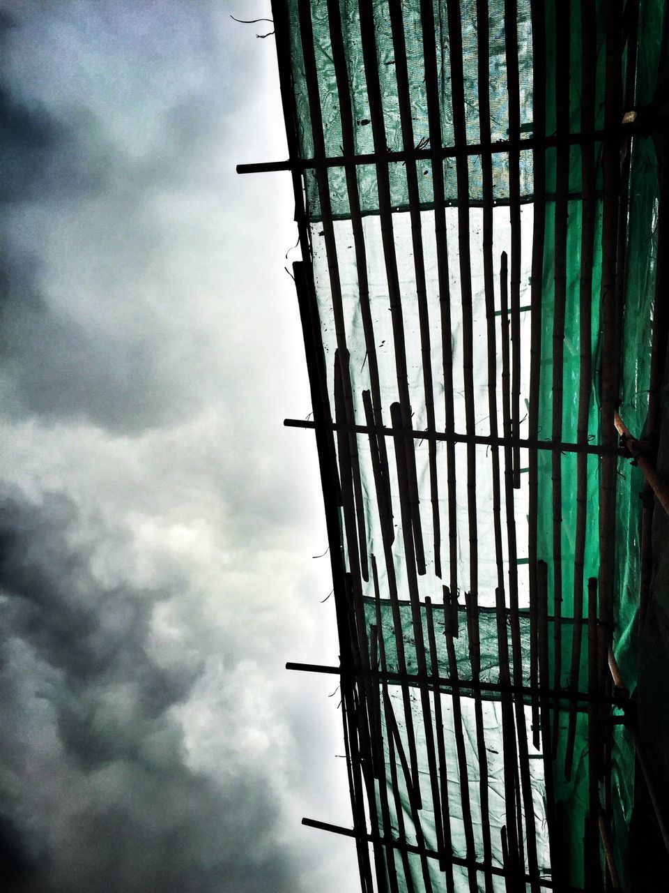 sky, architecture, built structure, building exterior, low angle view, cloud - sky, office building, tall - high, modern, cloudy, tower, skyscraper, reflection, city, cloud, building, tall, day, development, outdoors