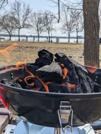 Close-up of bonfire on barbecue grill