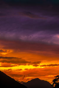 Scenic view of dramatic sky during sunset