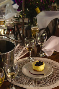 Glass of wine served on table at restaurant