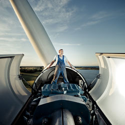 Portrait of man on boat against sky