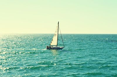 Boat sailing in sea