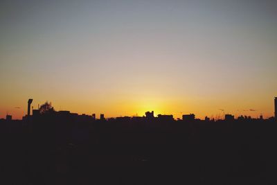 View of buildings at sunset