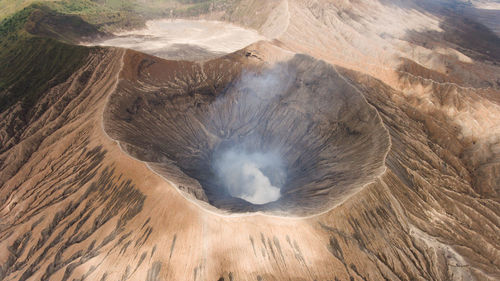 Crater with active volcano smoke in east jawa, indonesia. volcano crater mount gunung bromo 