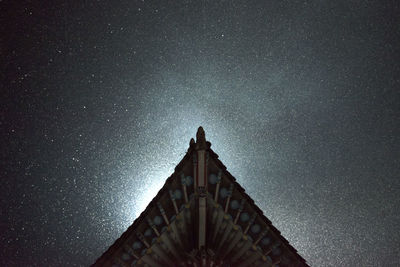 Low angle view of building against sky at night