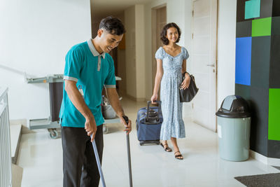 Side view of business colleagues working in office