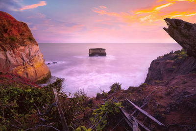 Scenic view of sea against sky during sunset